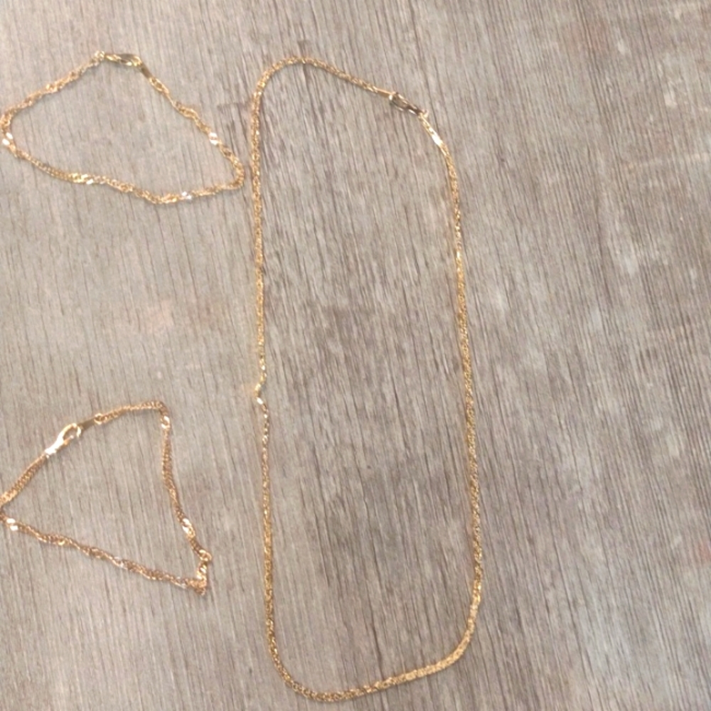 Gold necklace and bracelet and ankle bracelet